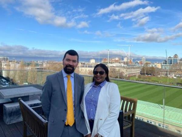 Zandile Ndlovu, with Joe O'Brien, Minister of State at the Department of Rural and Community Development and at the Department of Social Protection and at the Department of Children, Equality, Disability, Integration and Youth after she had presented at the 2023 Social Inclusion Forum at Trinity College Dublin 